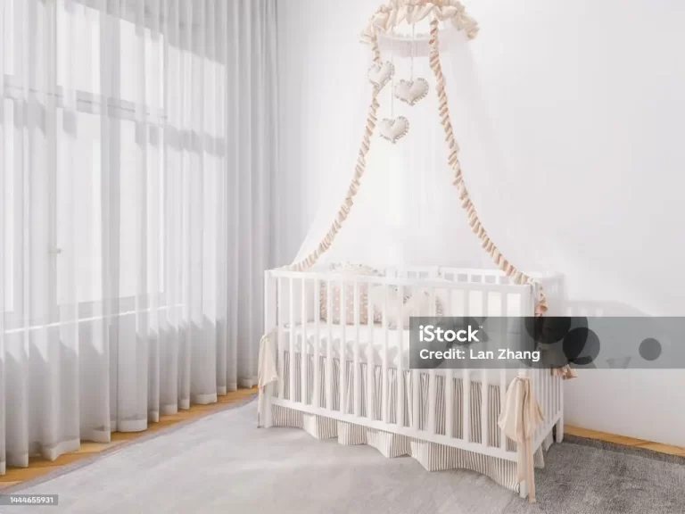 why should crib be away from the wall?