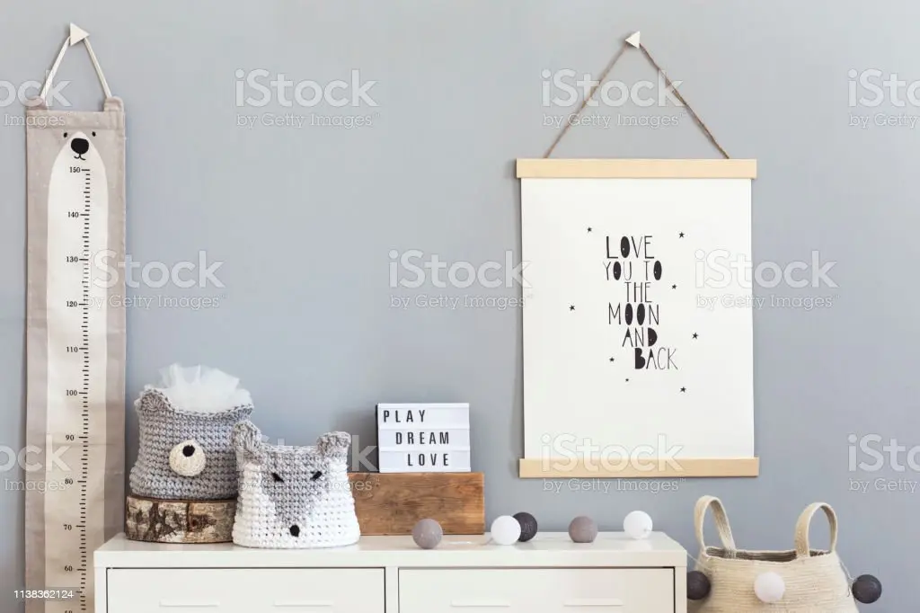 how do you hang wall decor in a nursery